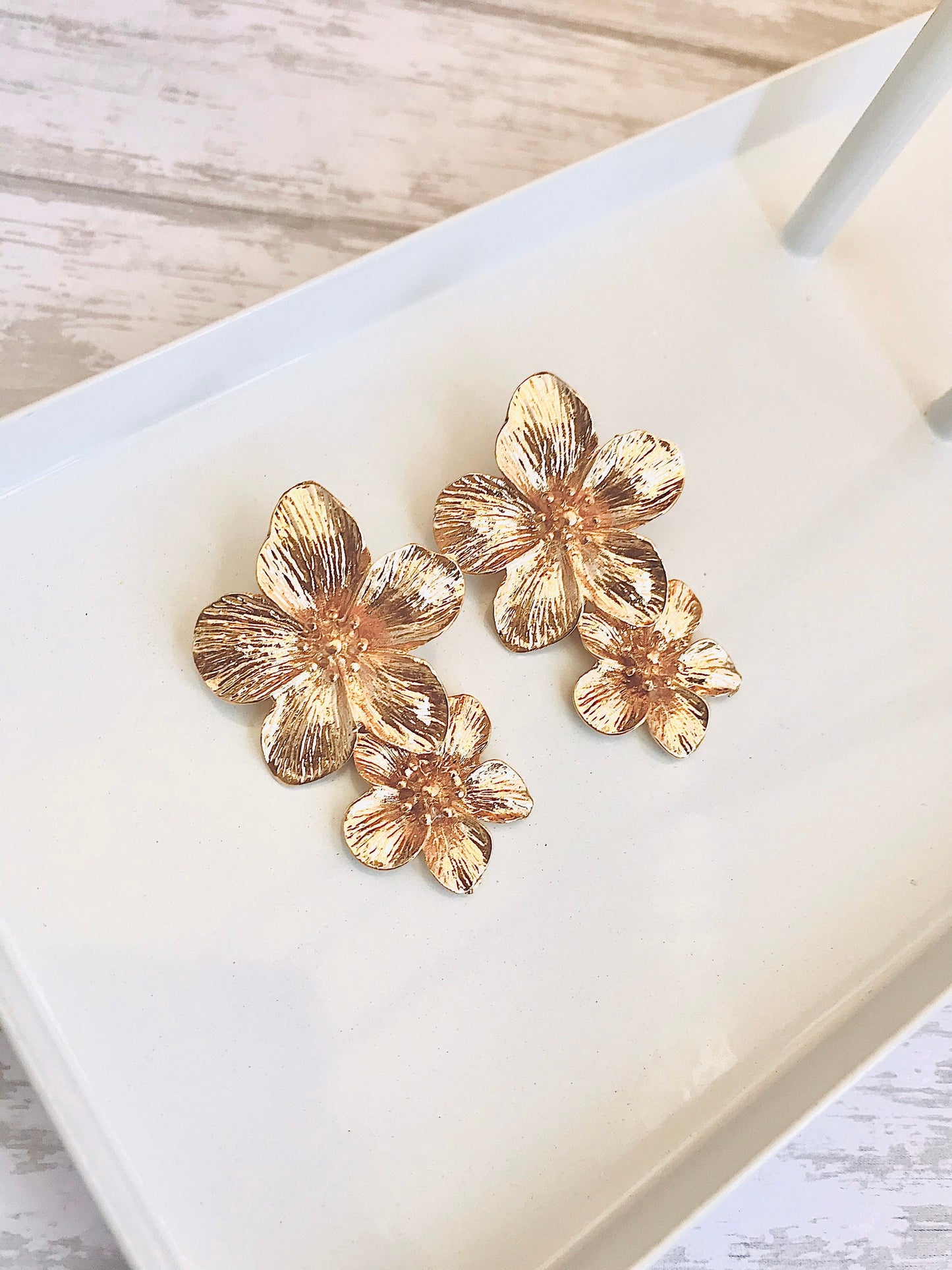 Gold flower drop earrings