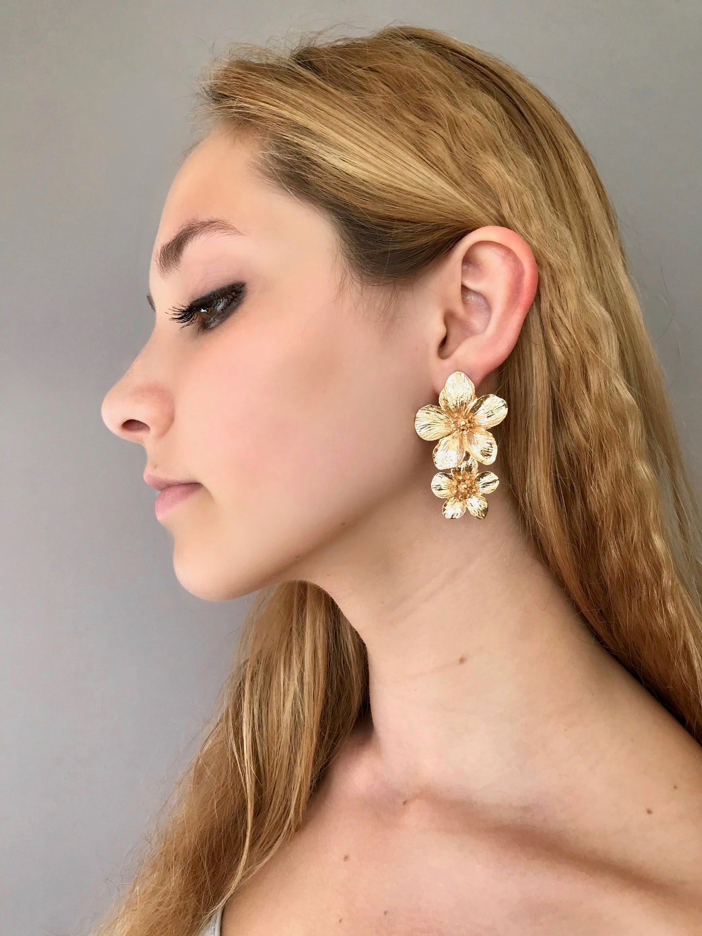 Gold flower drop earrings