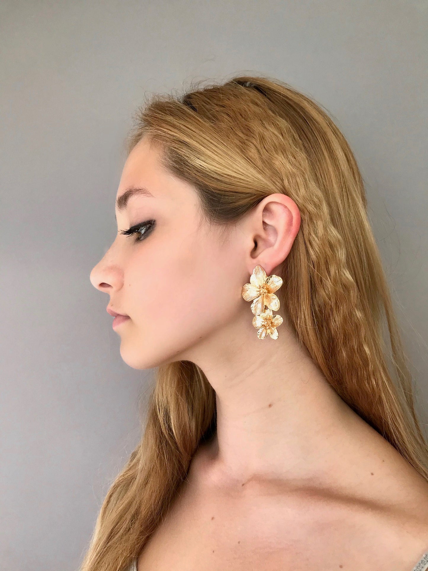 Gold flower drop earrings
