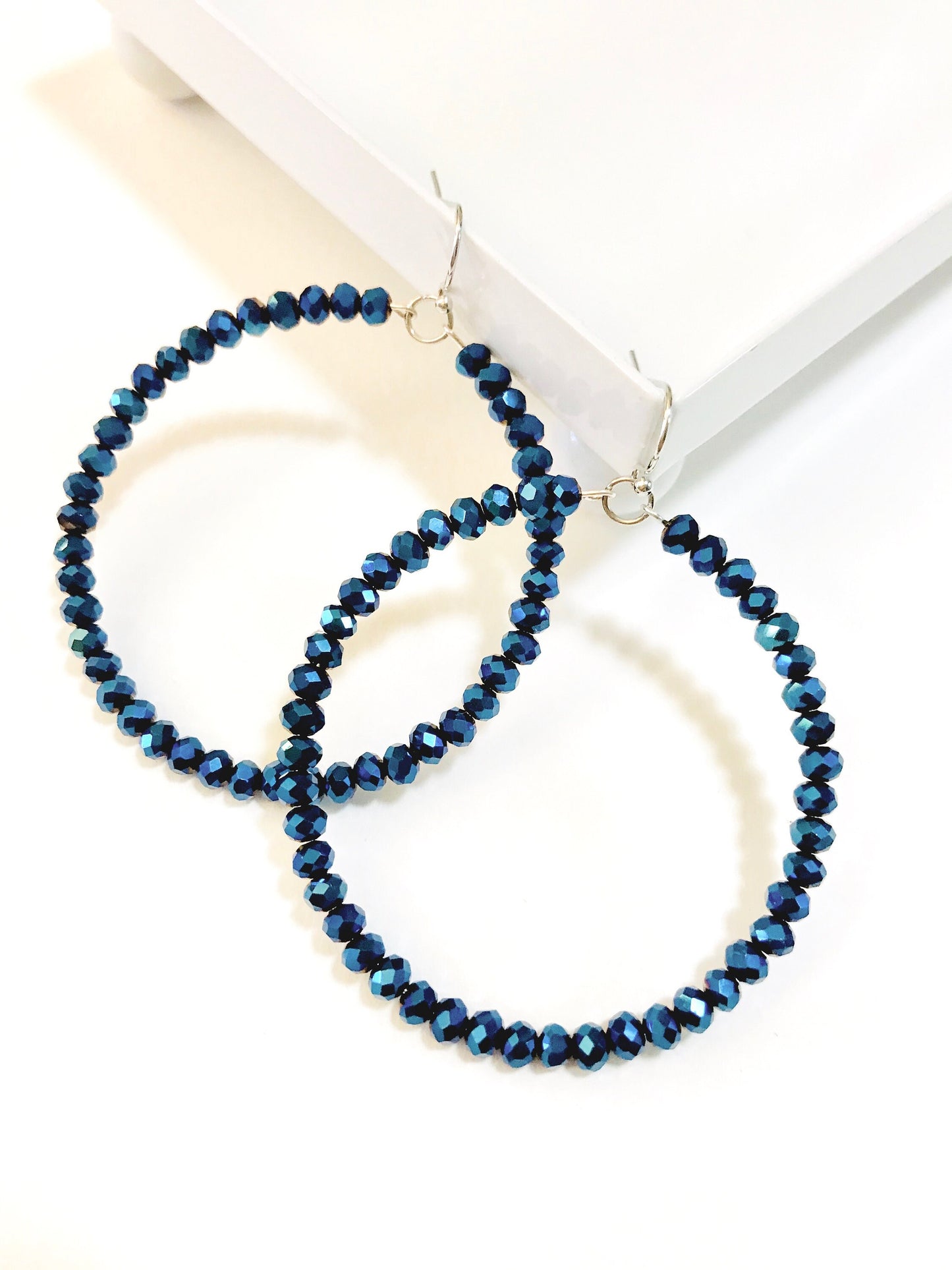 Midnight blue crystal hoop earrings