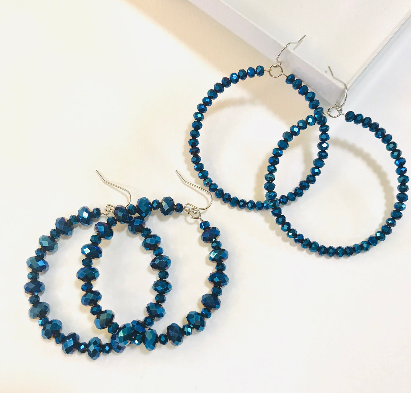 Midnight blue crystal hoop earrings