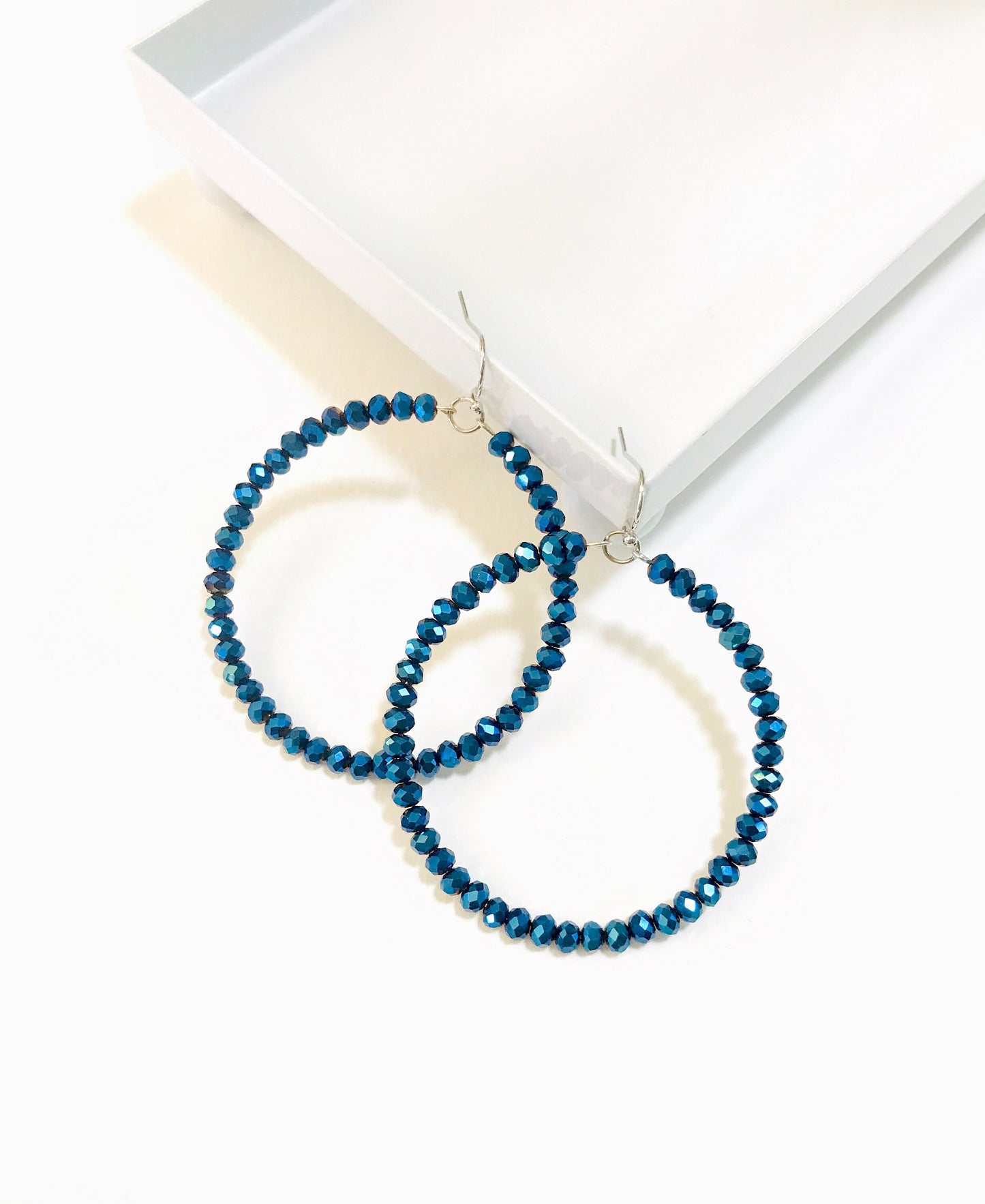 Midnight blue crystal hoop earrings