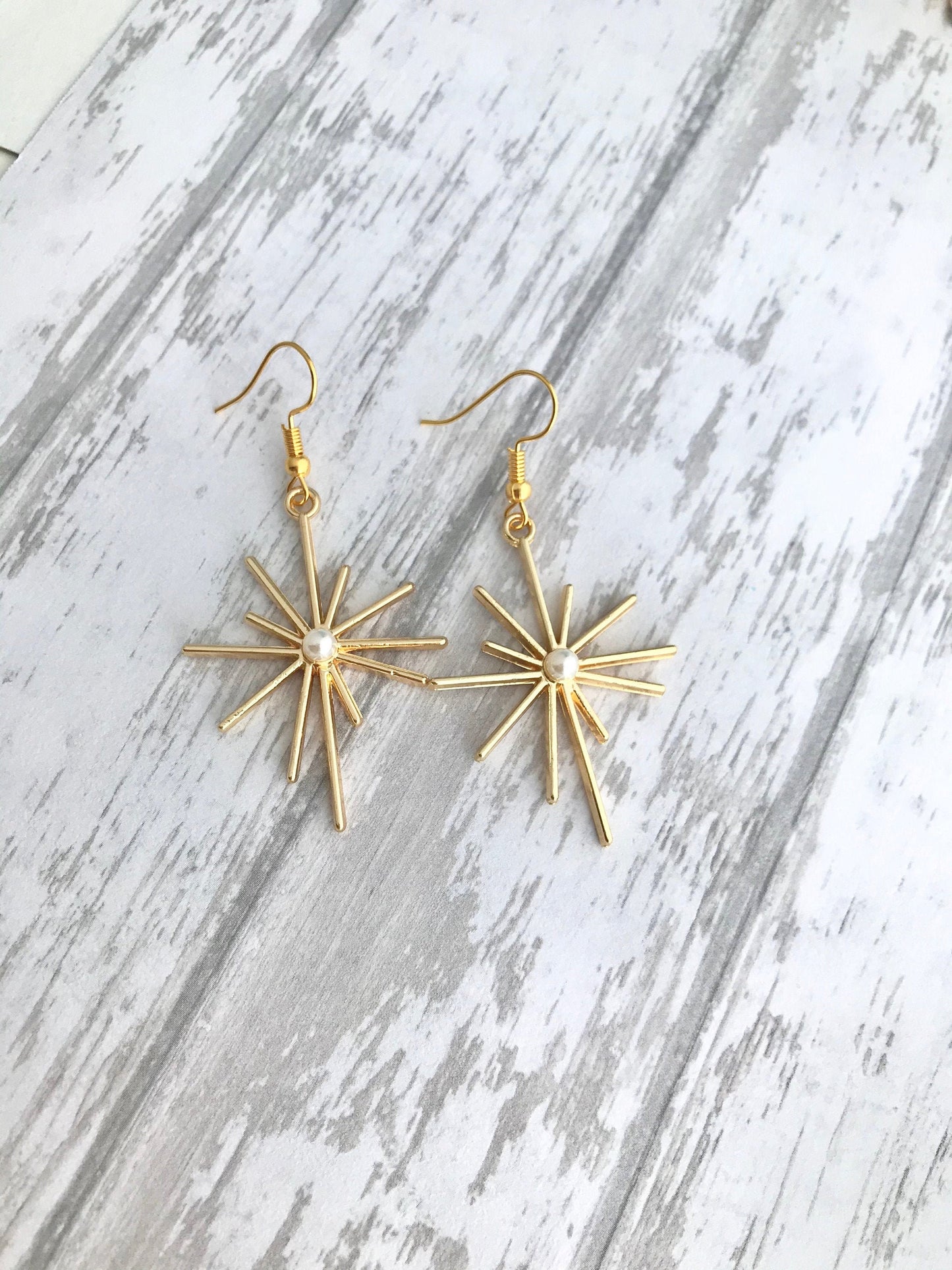 Gold star celestial earrings