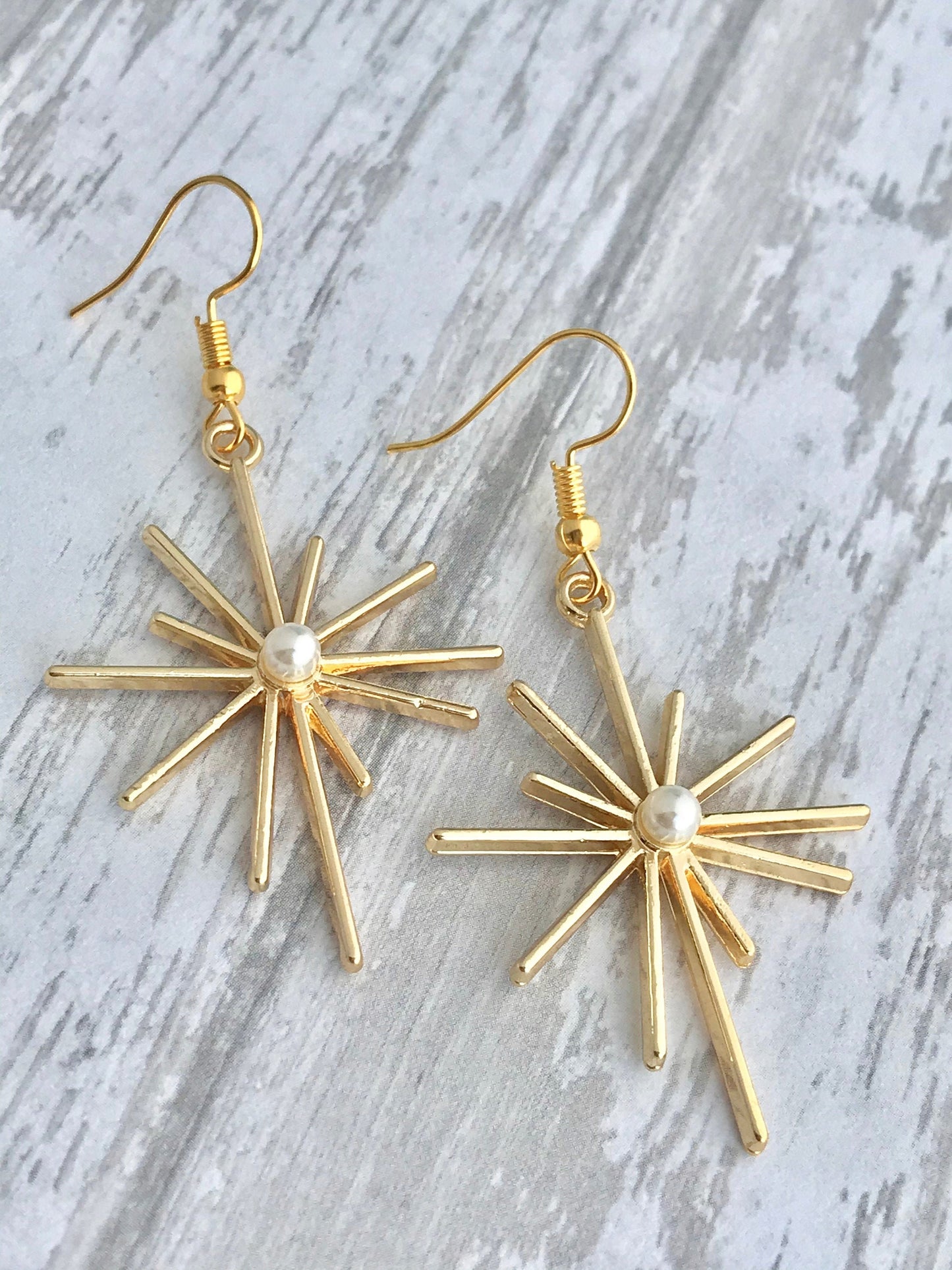 Gold star celestial earrings