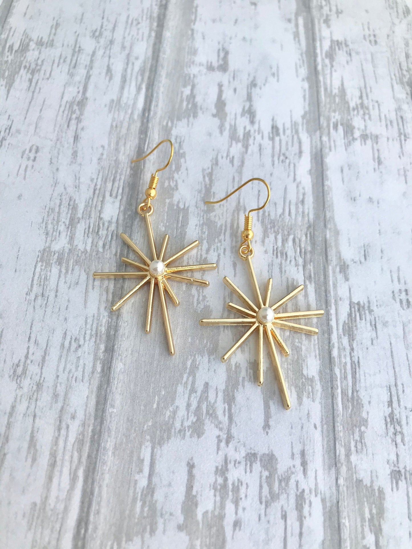 Gold star celestial earrings