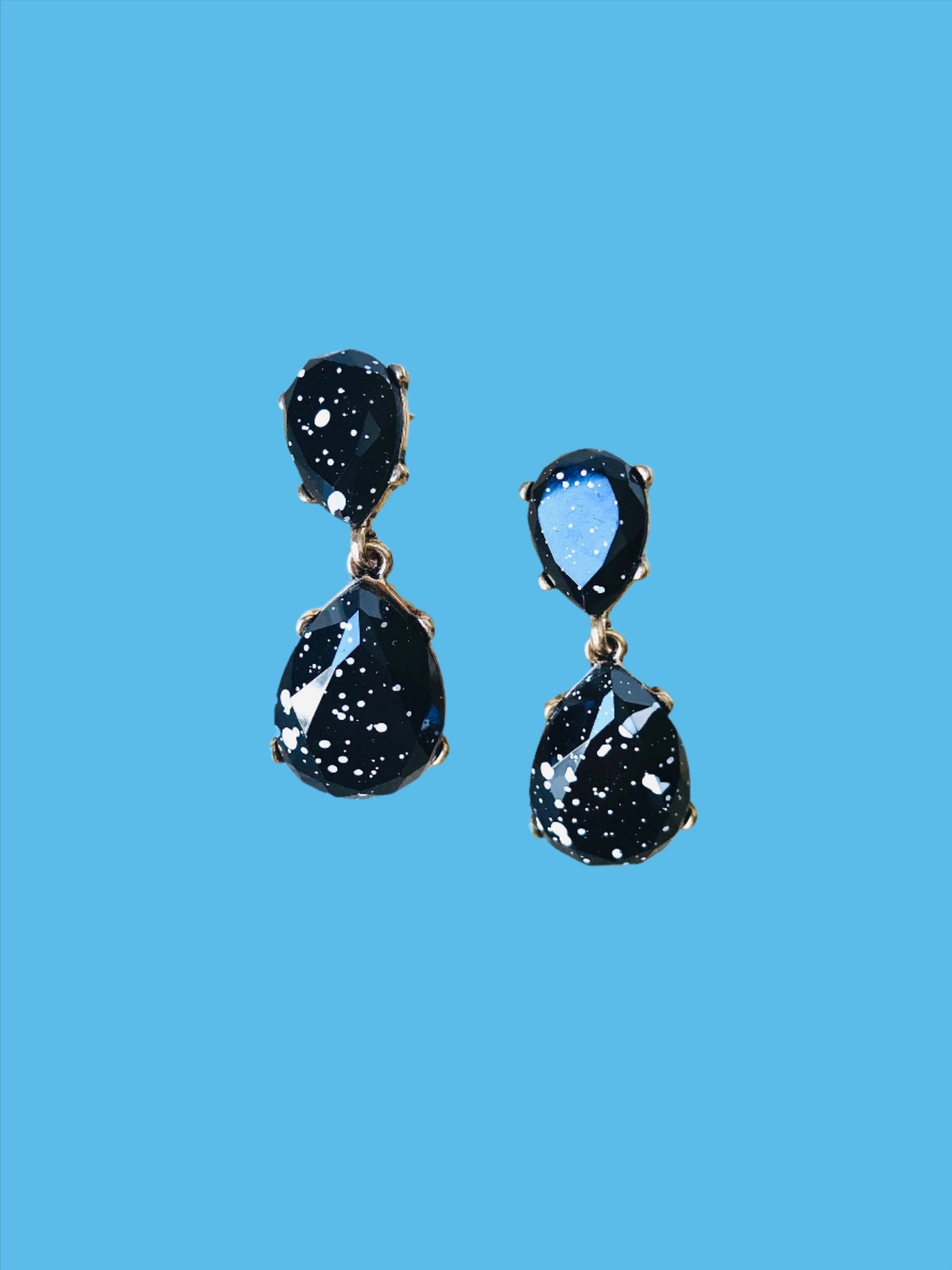 White splash black drop earrings