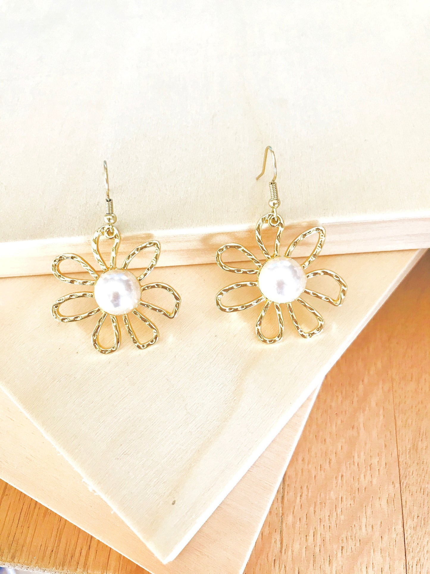 Golden flower pearl earrings