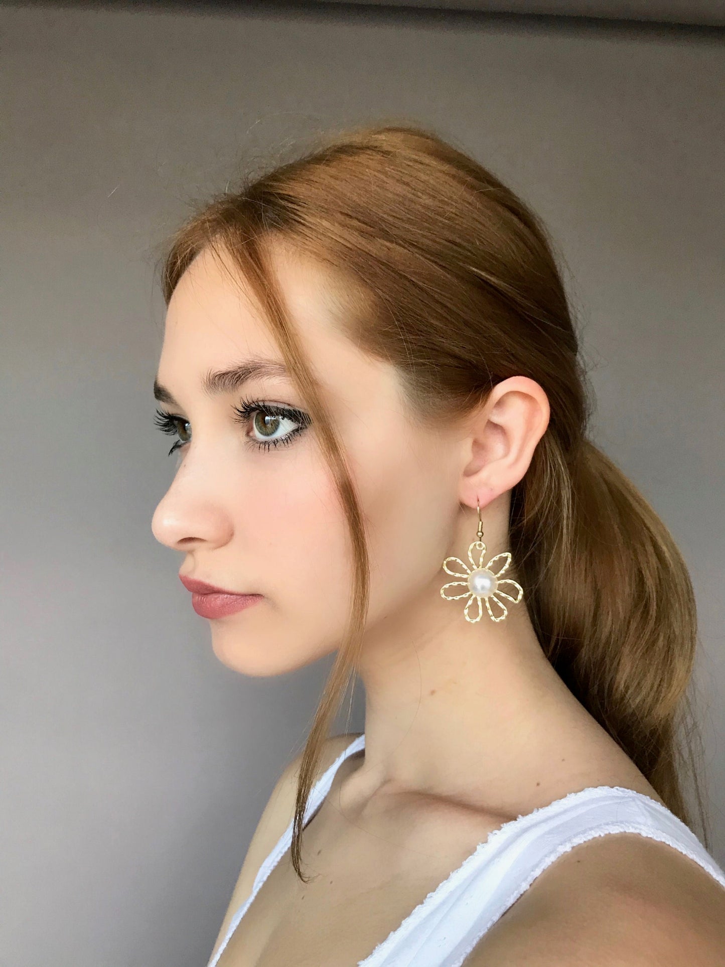 Golden flower pearl earrings