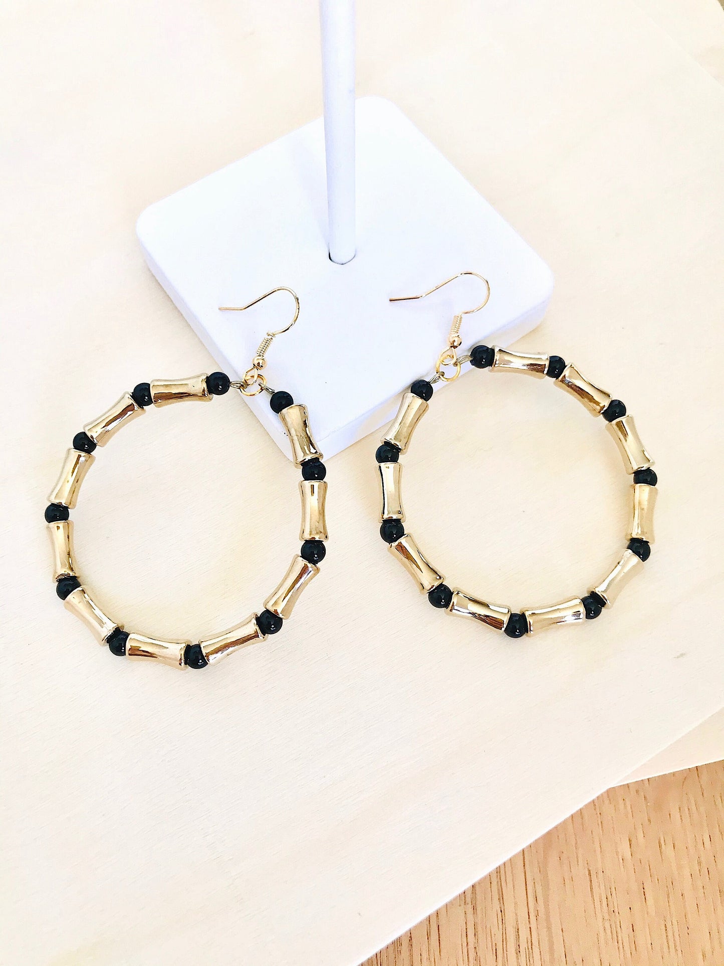 Black and gold statement hoop earrings