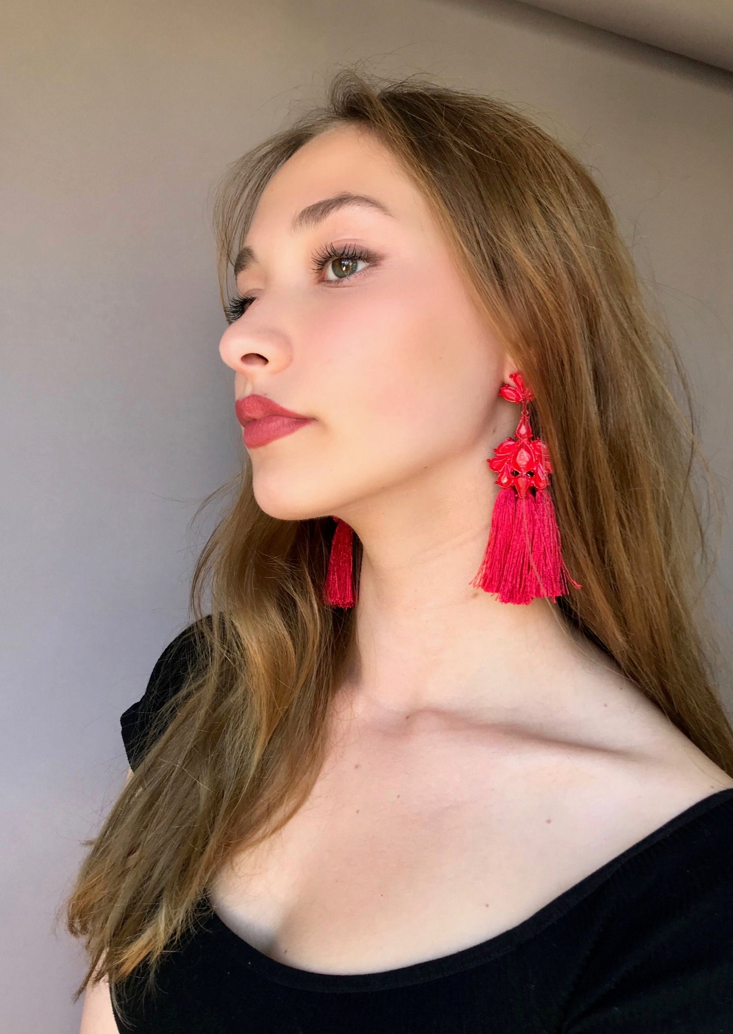 Red tassels statement earrings