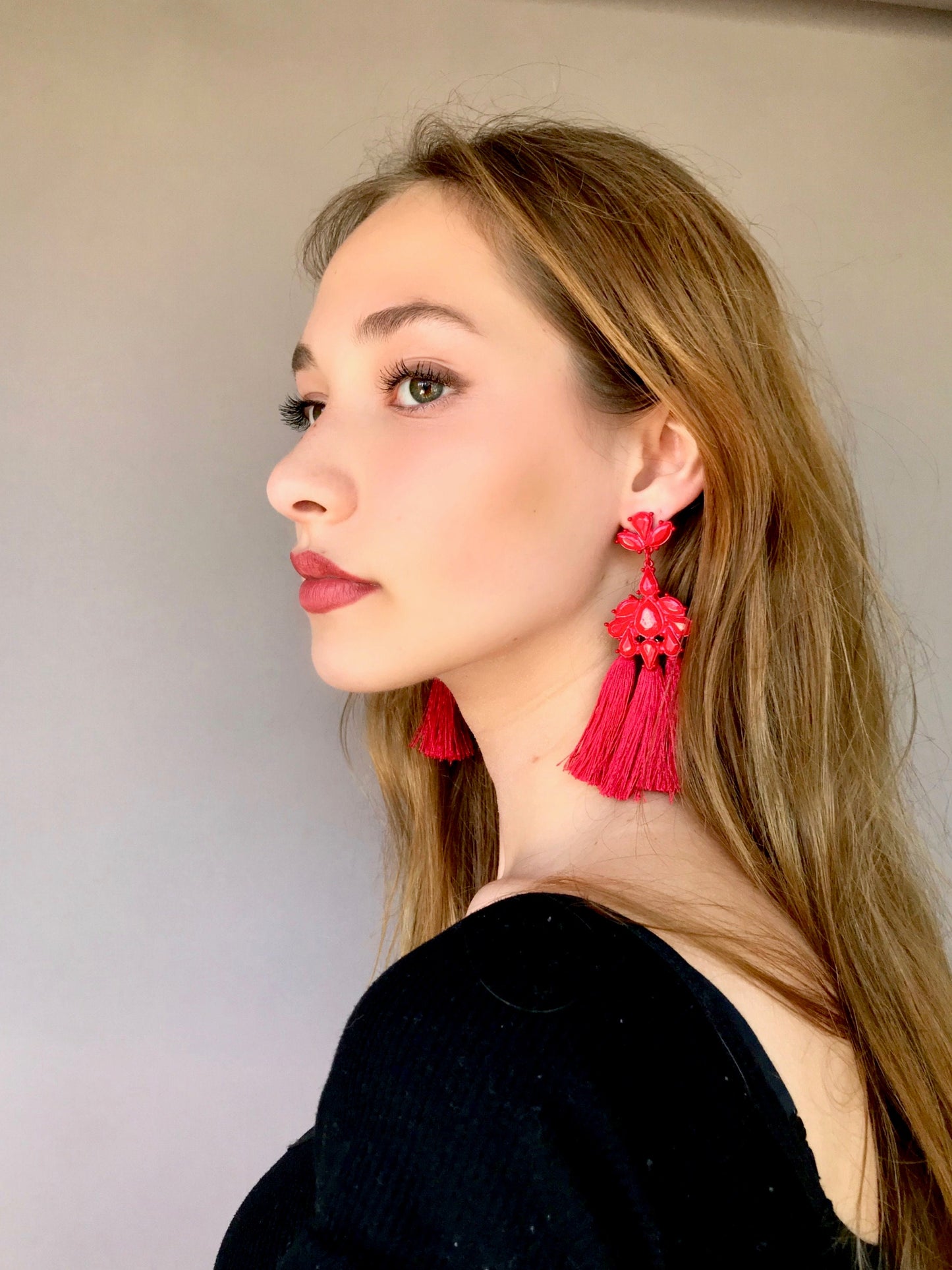 Red tassels statement earrings