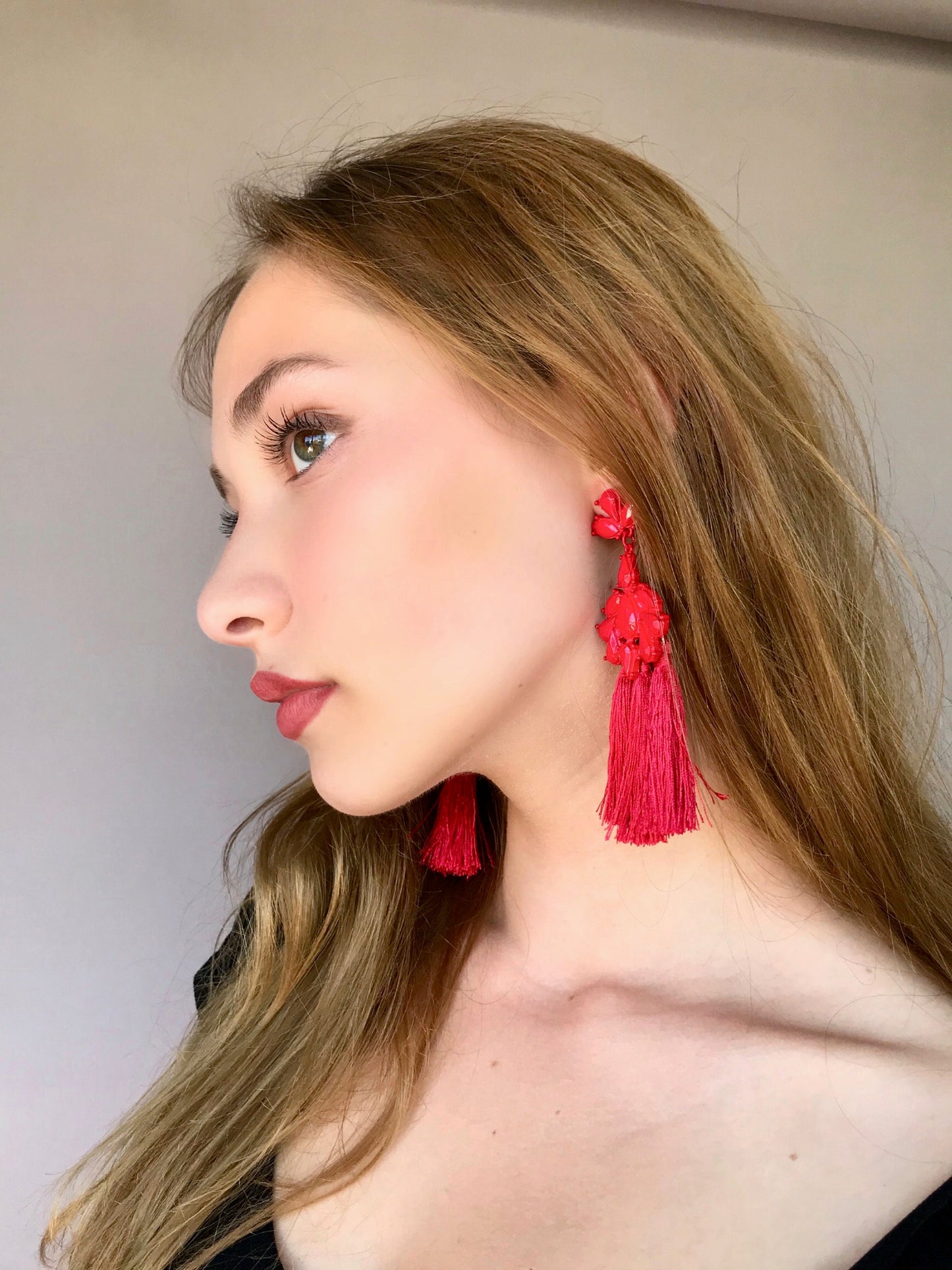 Red tassels statement earrings