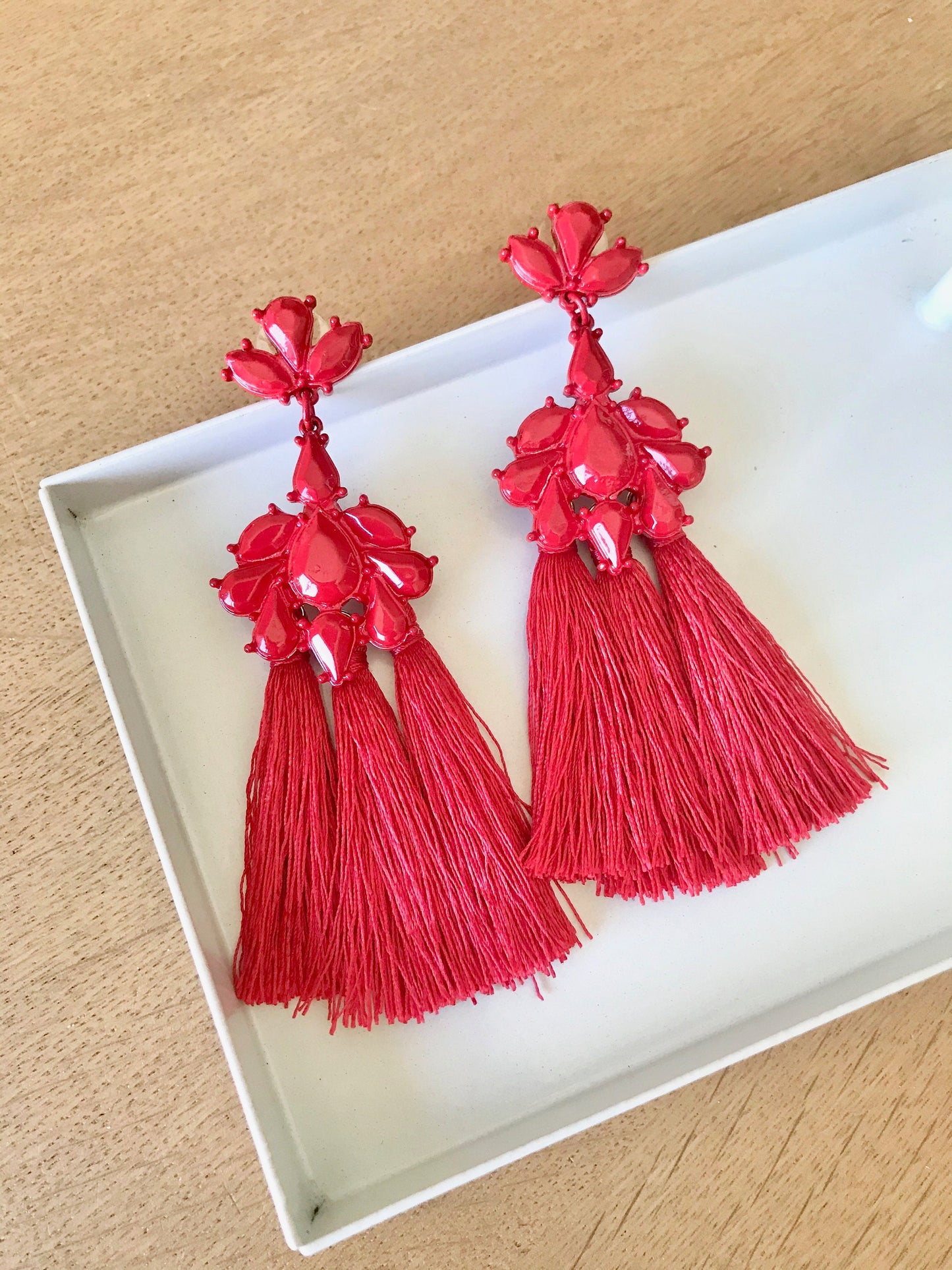 Red tassels statement earrings