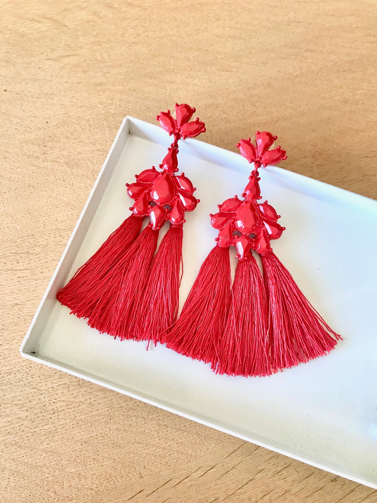 Red tassels statement earrings