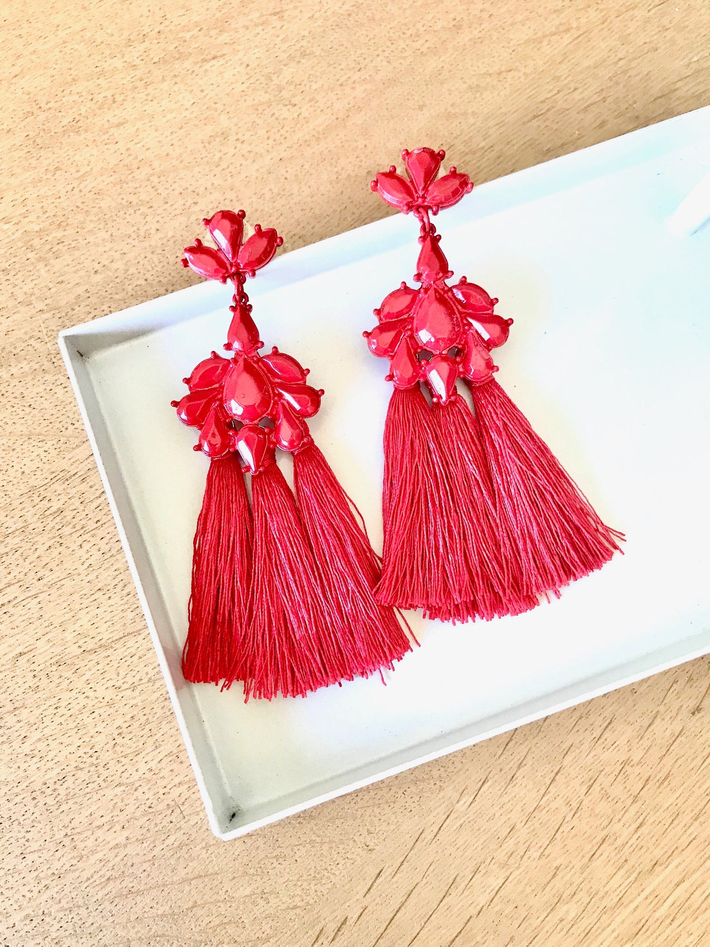 Red tassels statement earrings