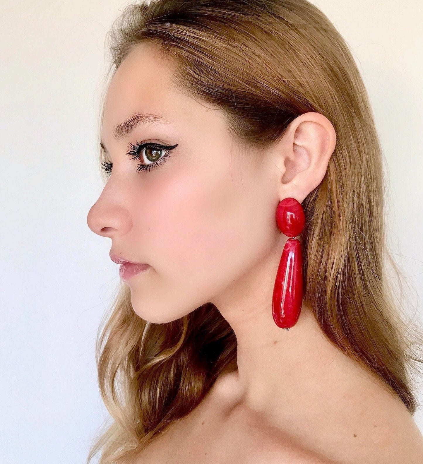 Large red teardrop statement earrings