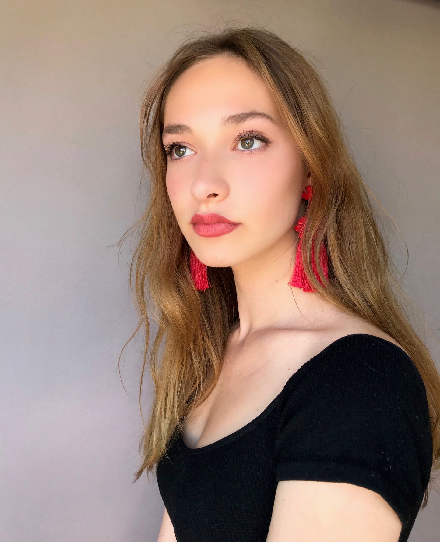 Red tassels statement earrings