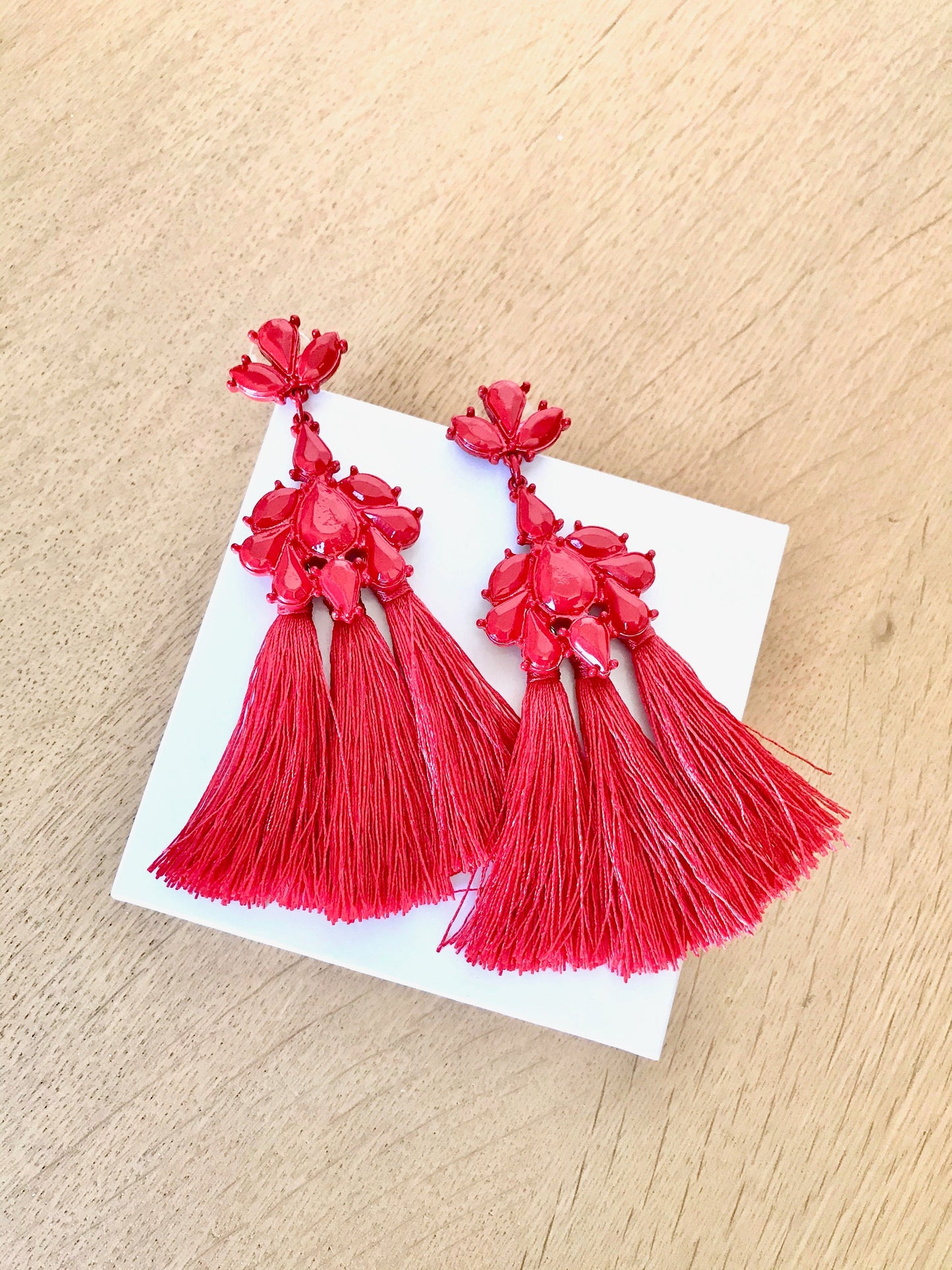 Red tassels statement earrings