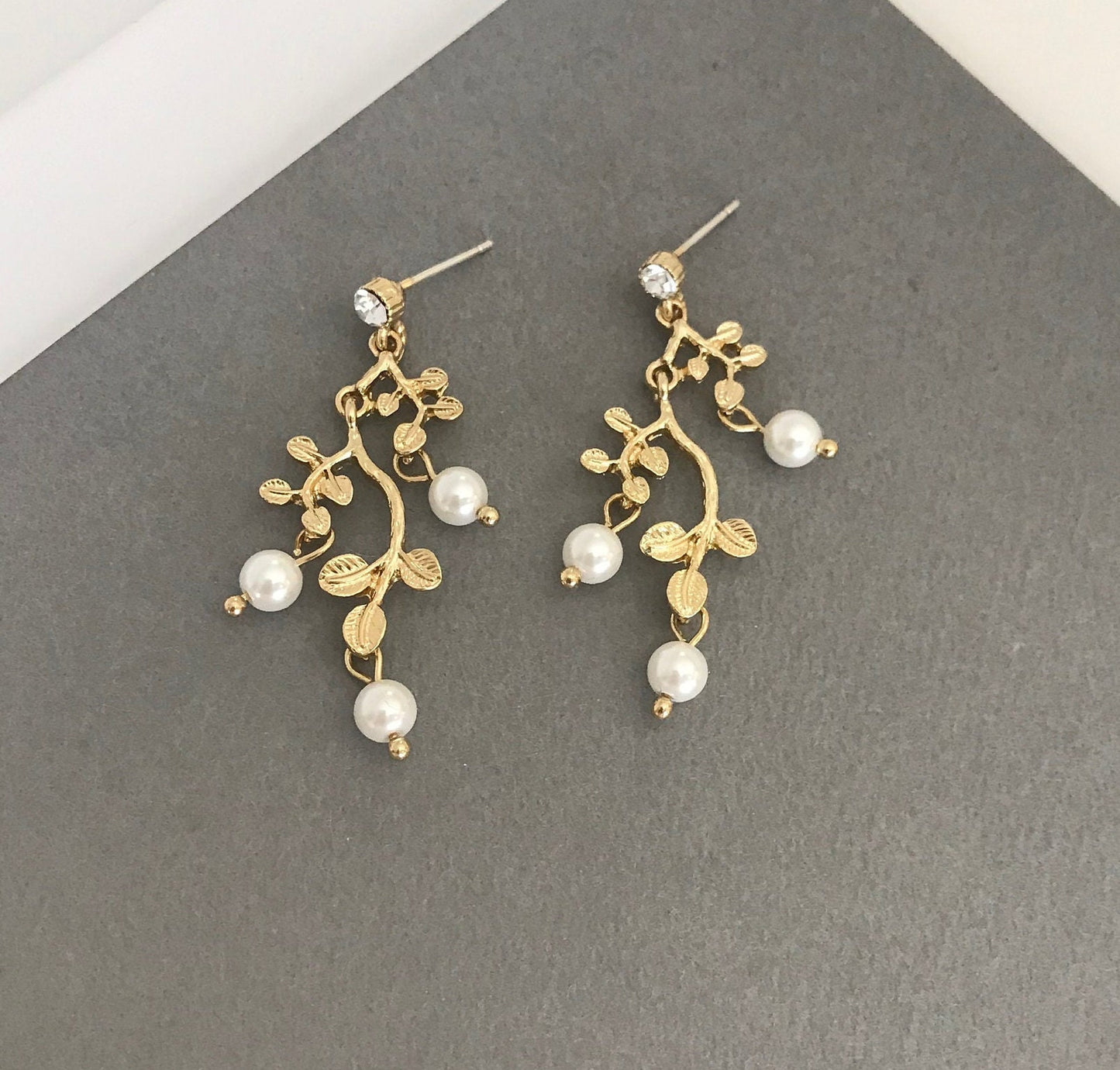 Gold leaf pearl earrings