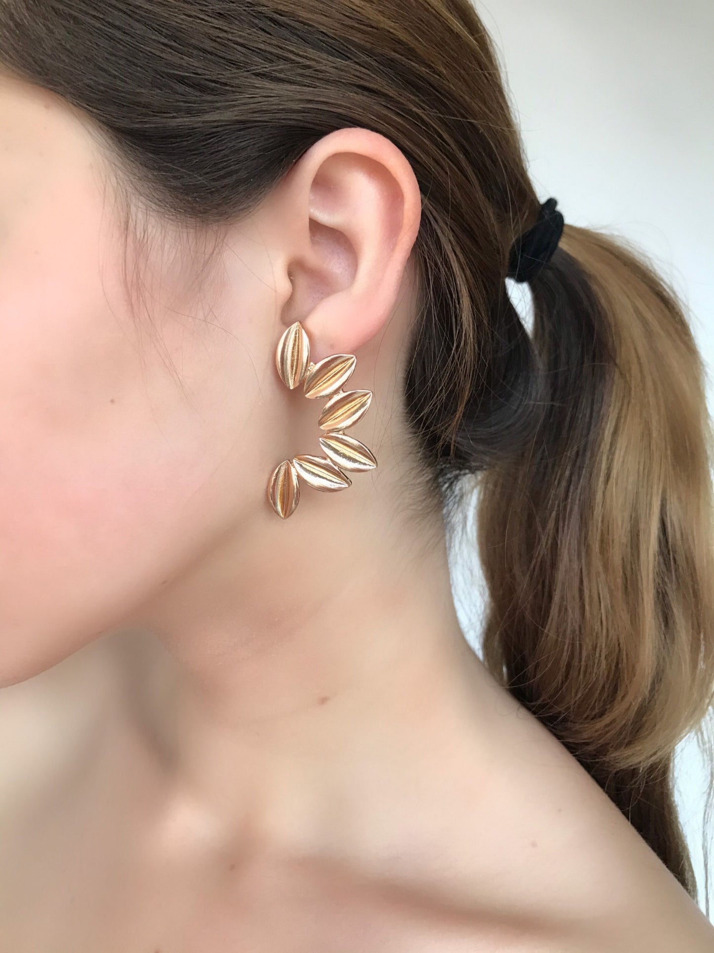 Gold coffee beans statement earrings