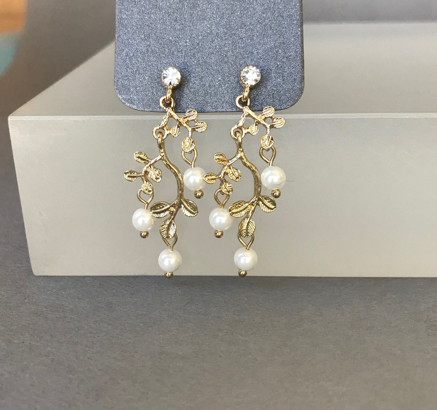 Gold leaf pearl earrings