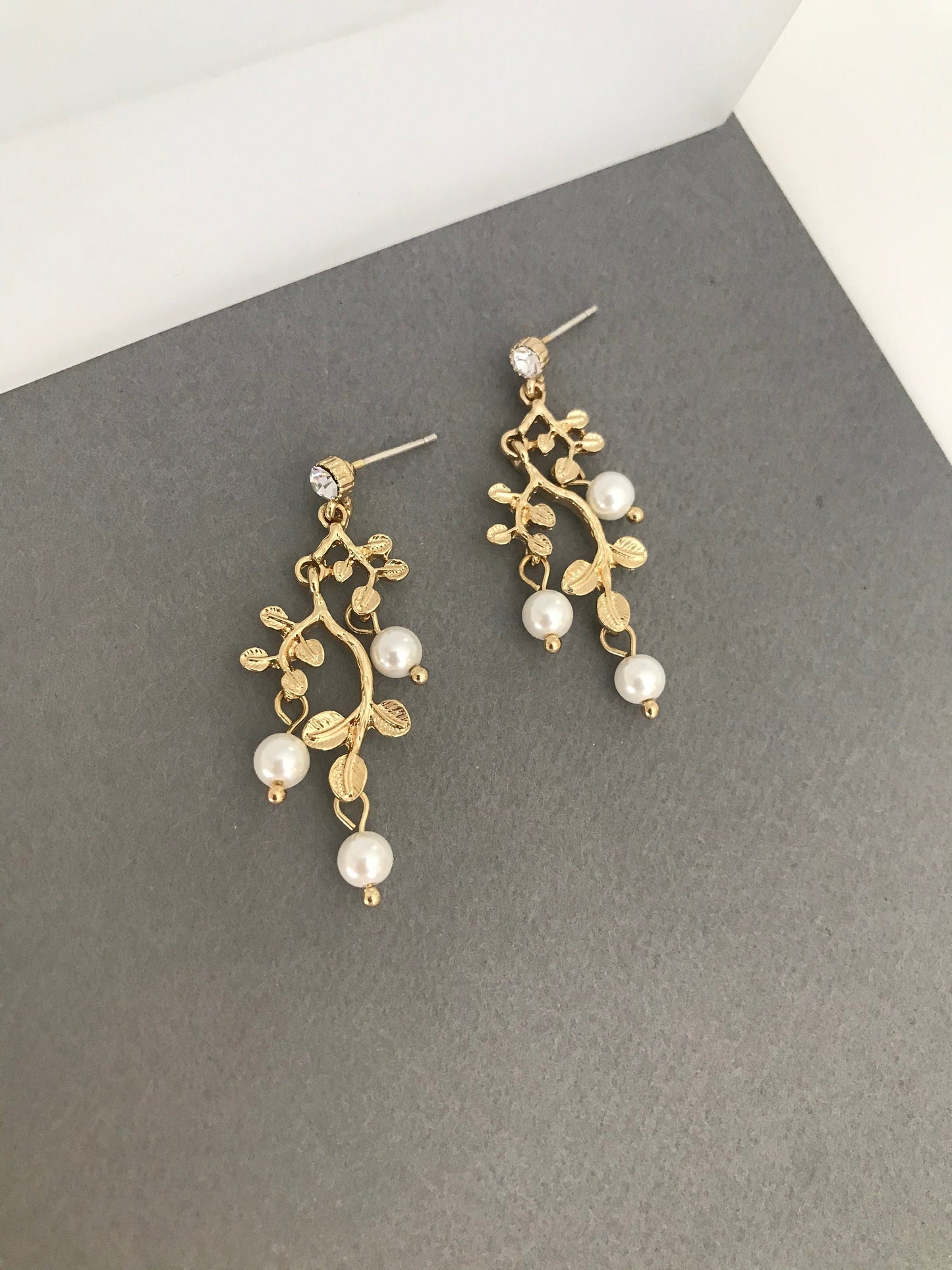 Gold leaf pearl earrings