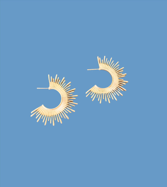 Gold starburst hoop earrings