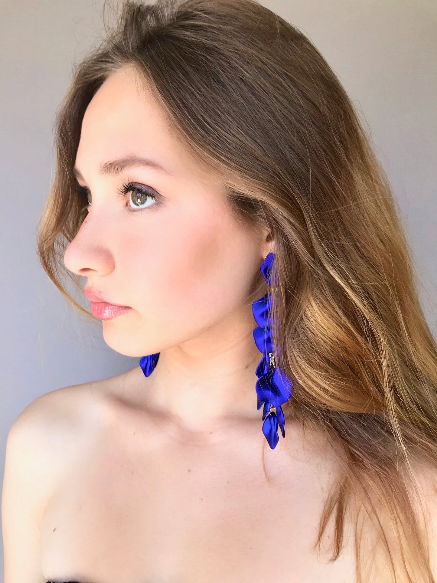 Electric blue petal statement earrings