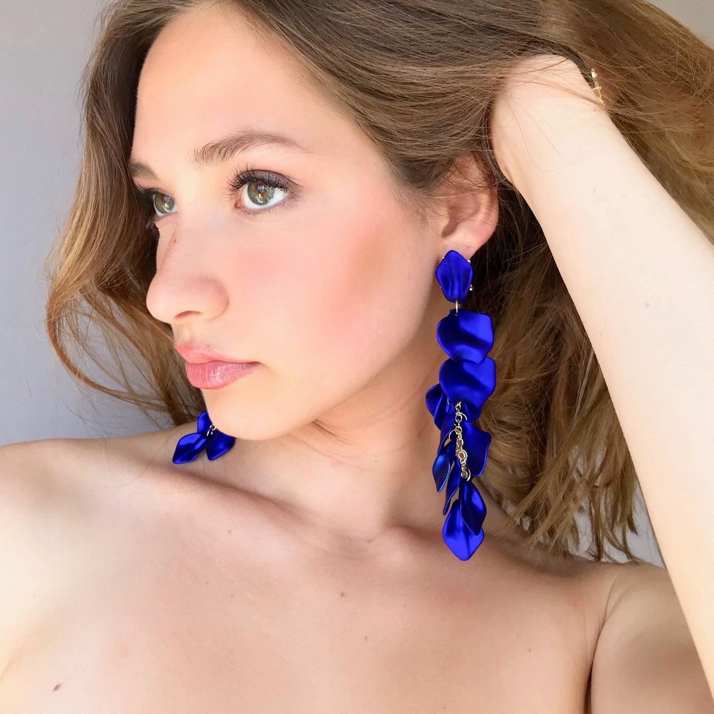 Electric blue petal statement earrings