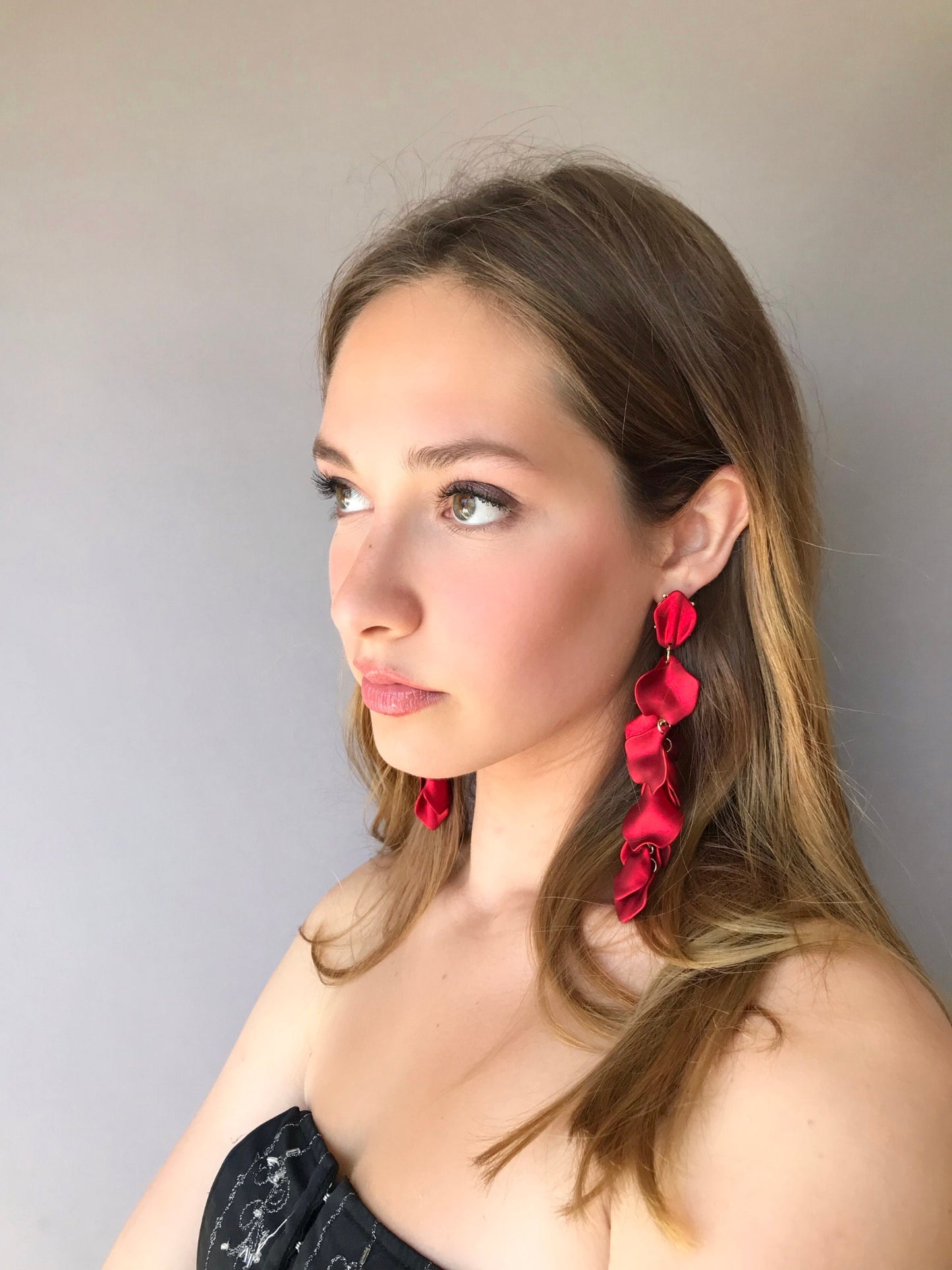 Red long drop petal earrings