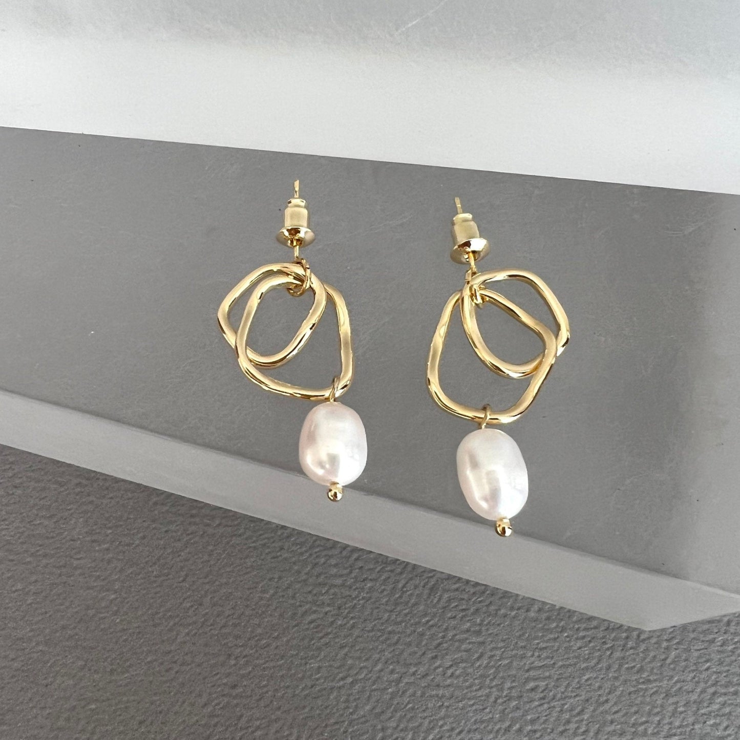 Gold design pearl earrings