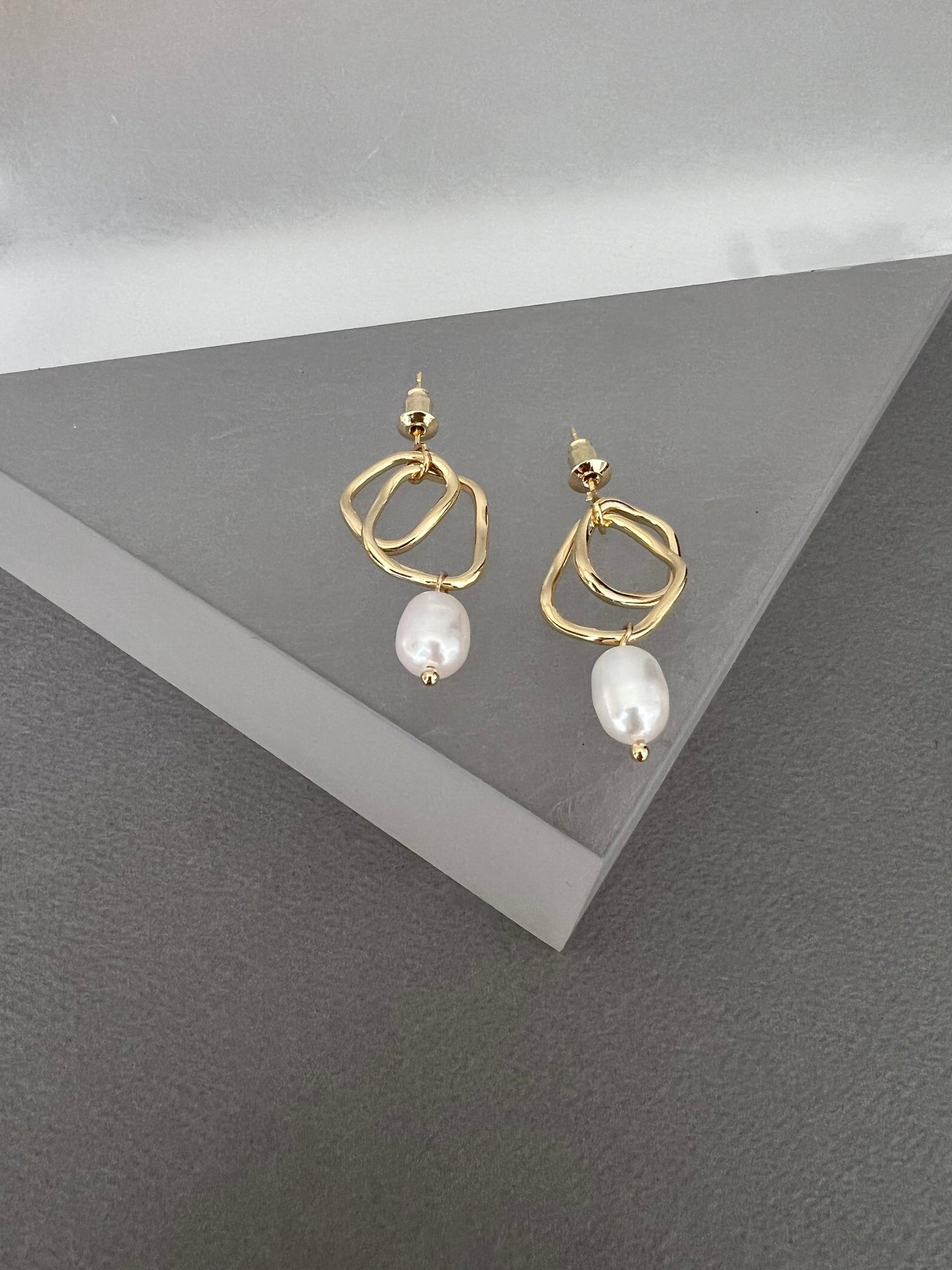 Gold design pearl earrings