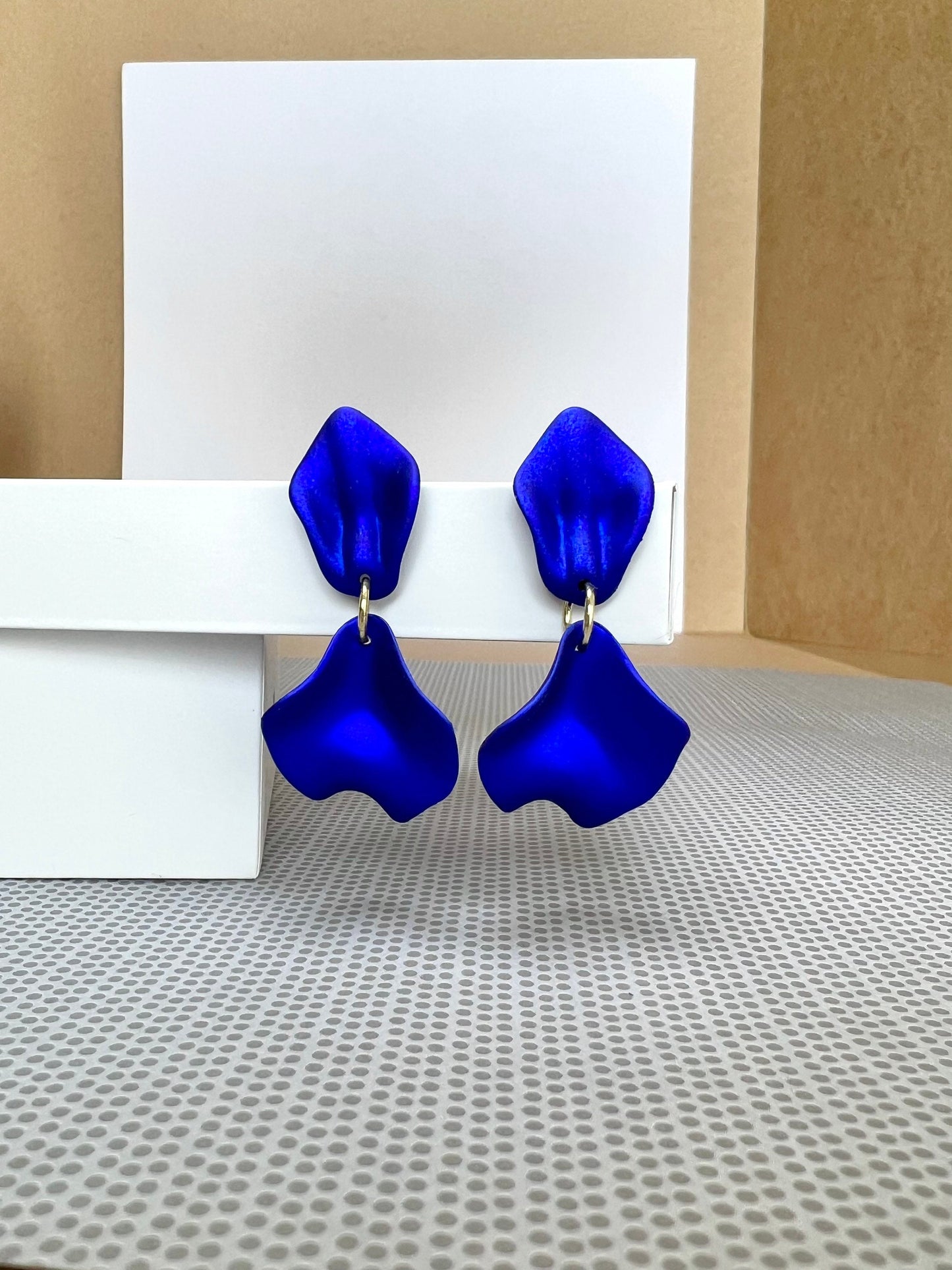 Small white petal earrings