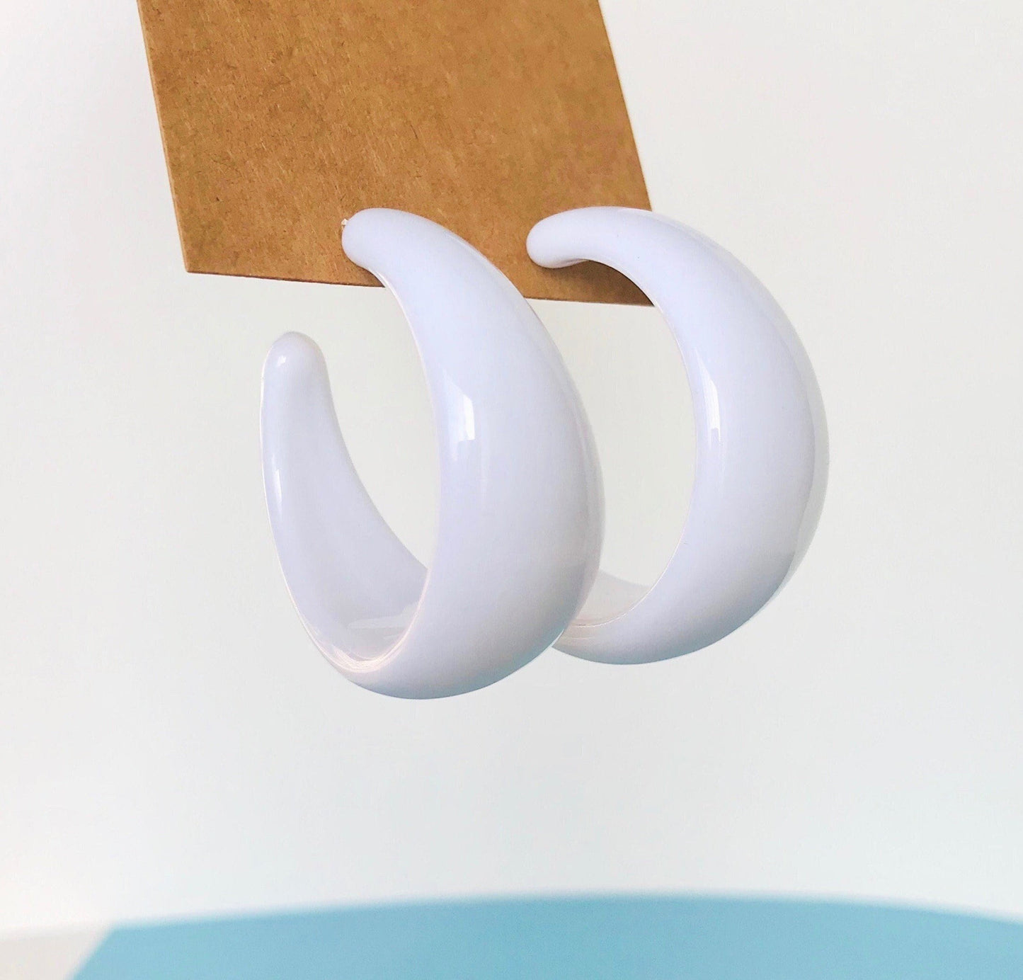 White acrylic hoop earrings