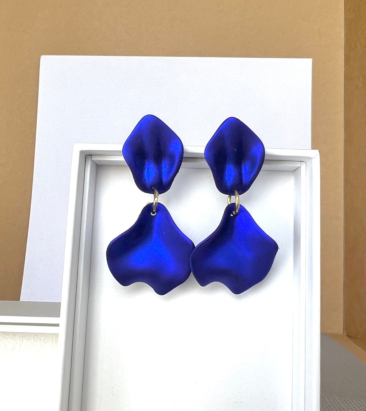 Small white petal earrings