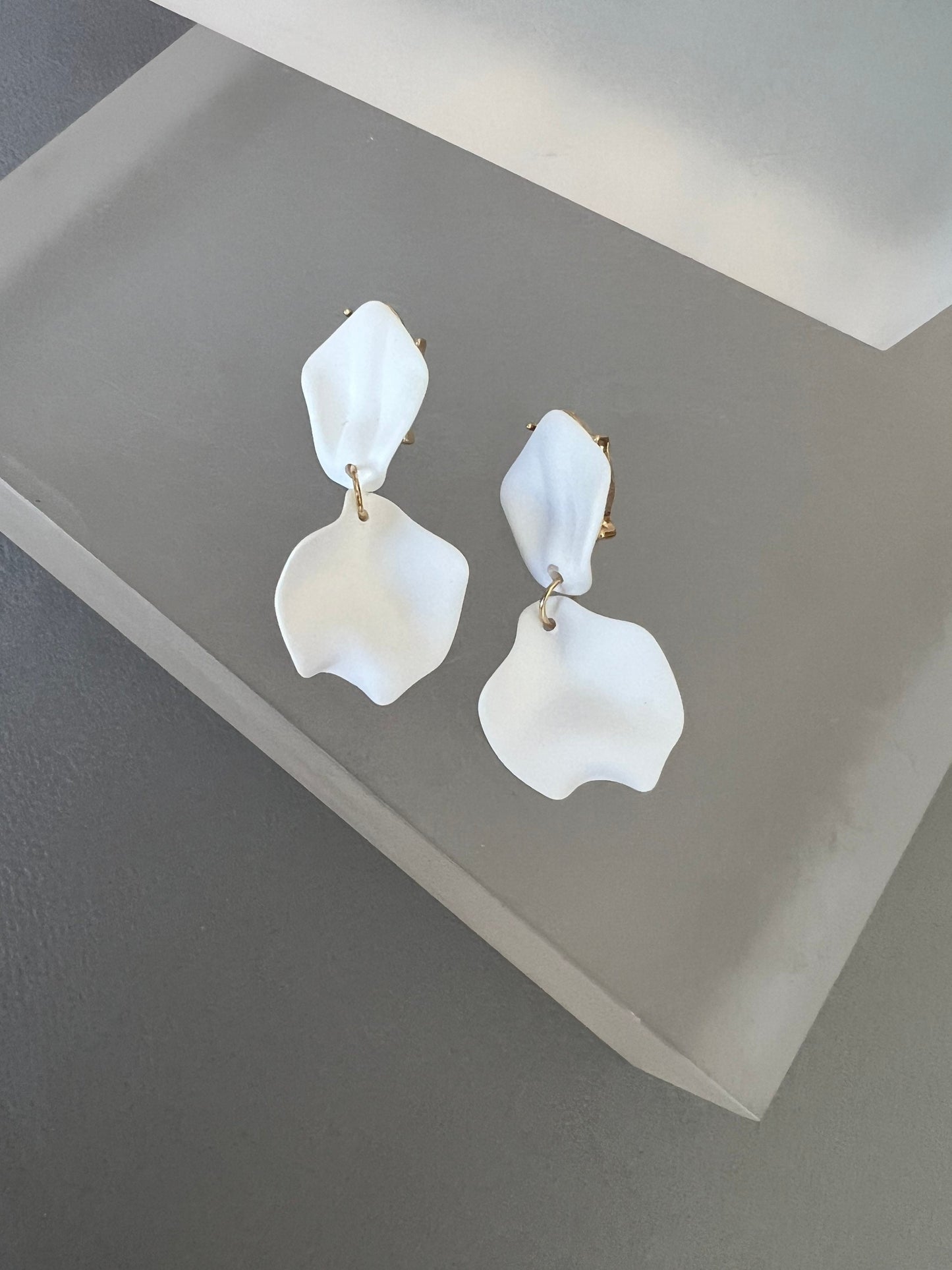 Small white petal earrings