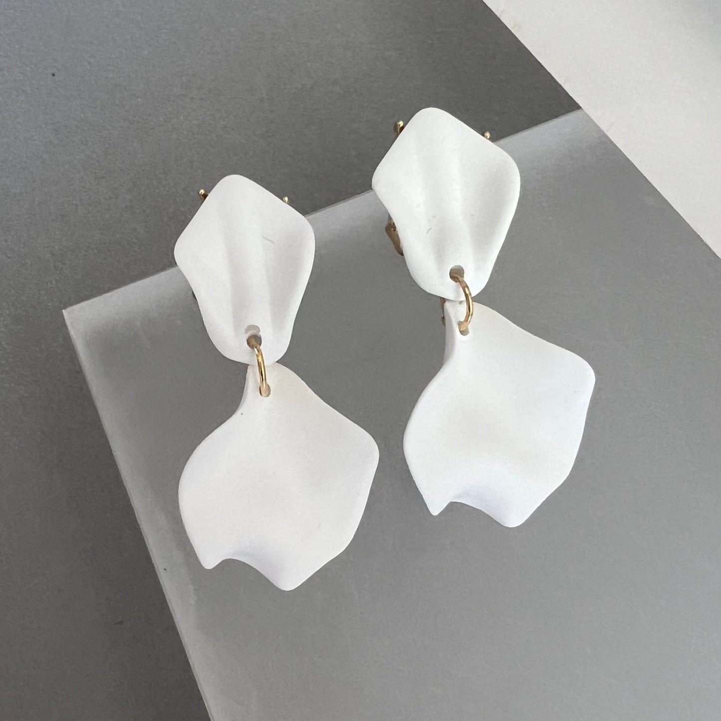 Small white petal earrings