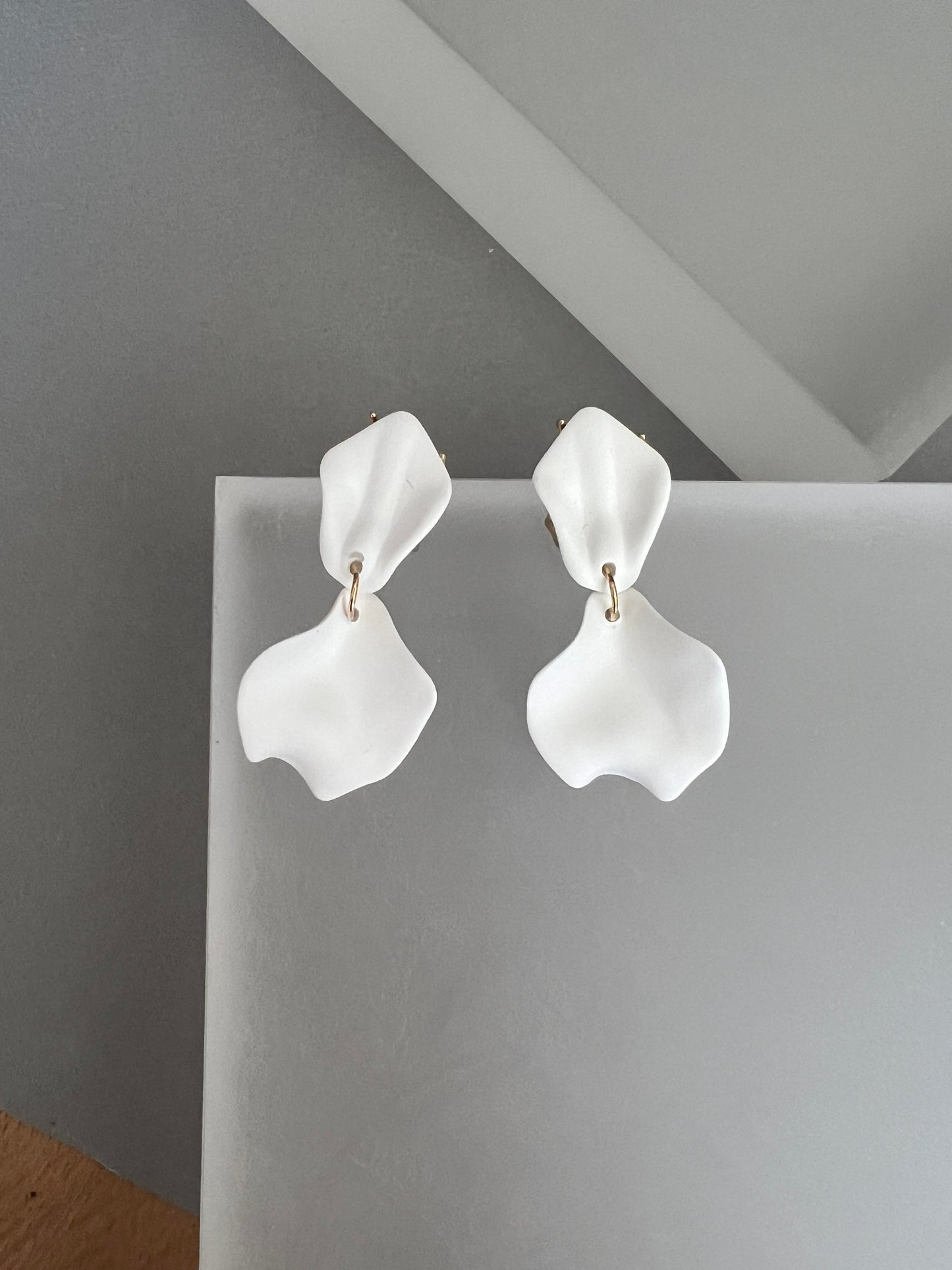 Small white petal earrings