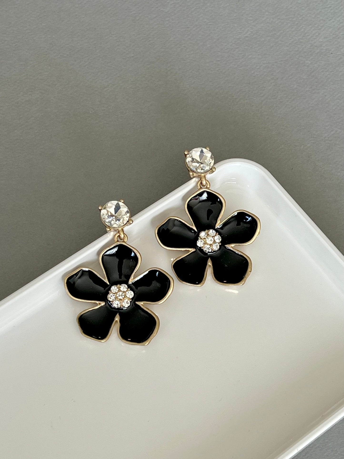 Large black flower earrings