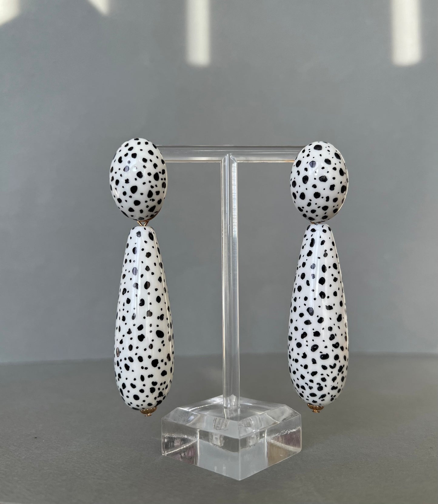 Large black spots teardrop white earrings