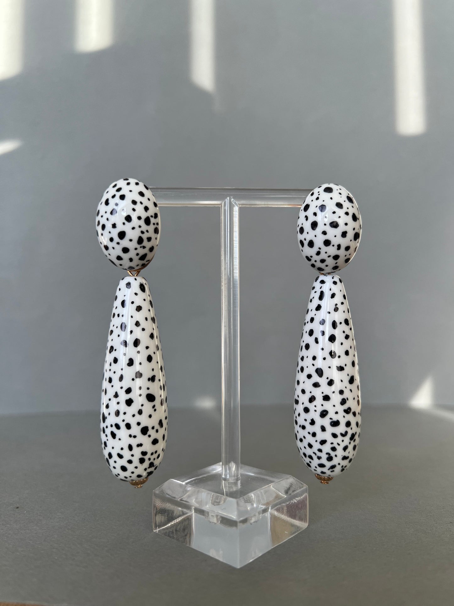 Large black spots teardrop white earrings