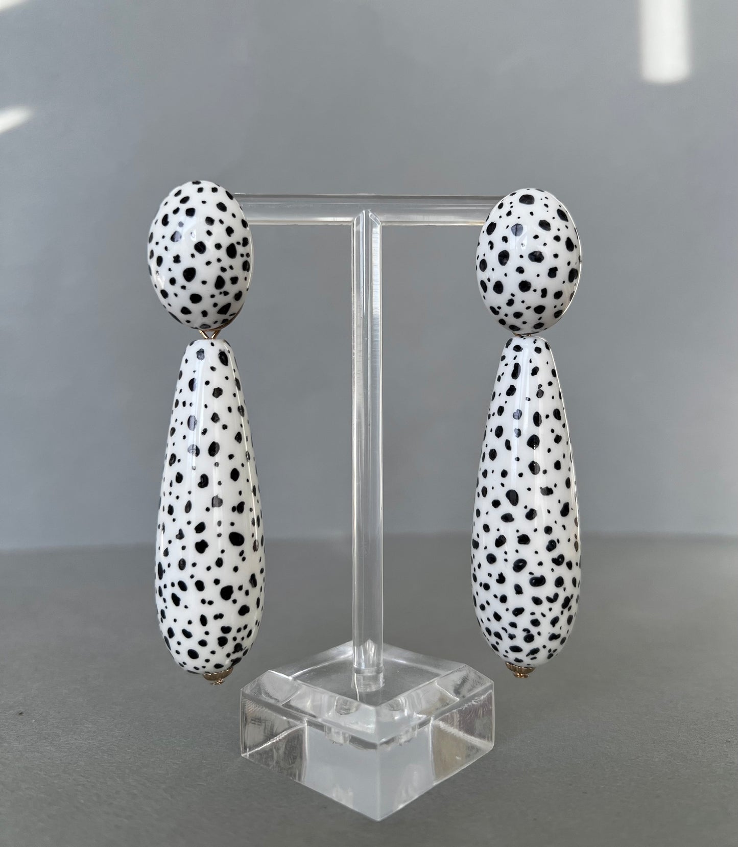 Large black spots teardrop white earrings