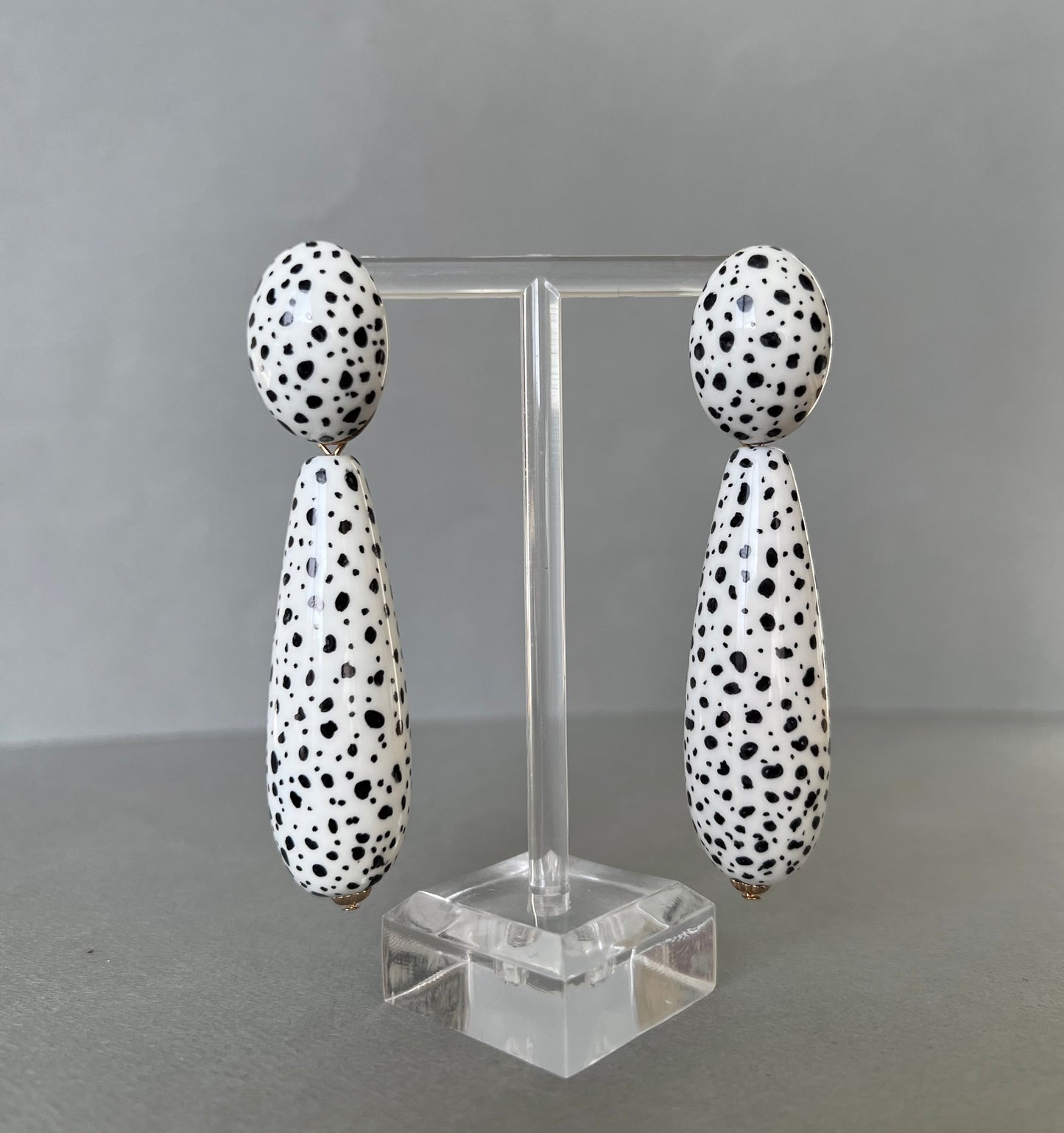 Large black spots teardrop white earrings