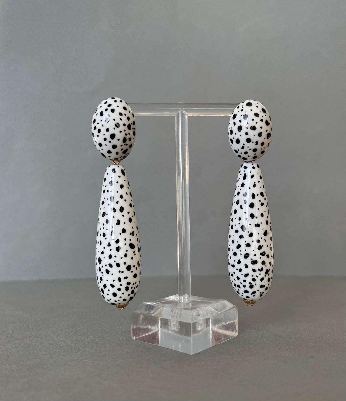 Large black spots teardrop white earrings