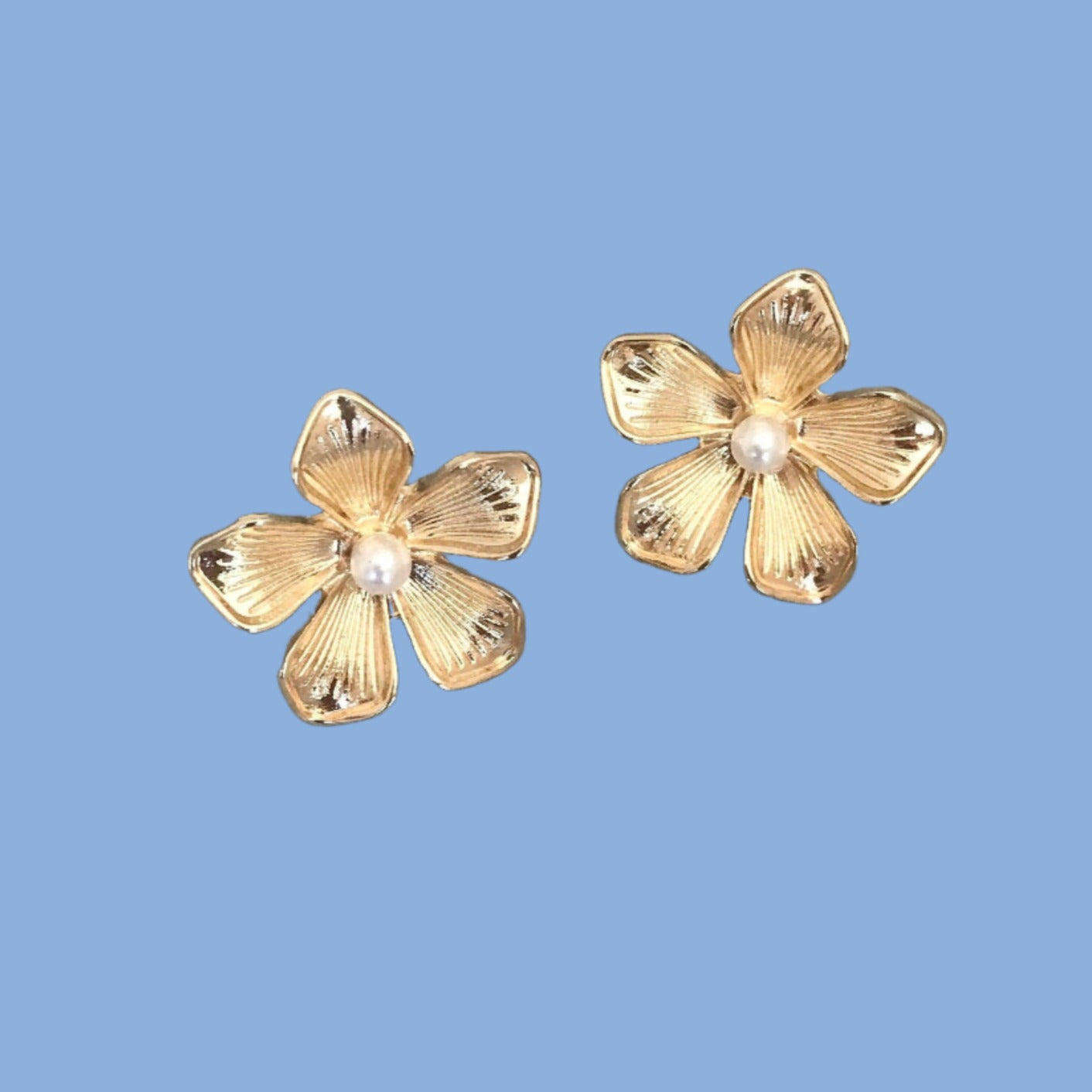 Gold flower stud earrings
