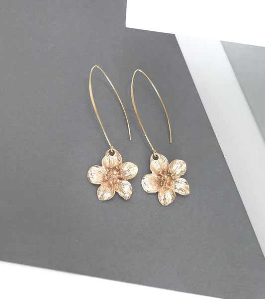 Gold daisy long drop flower earrings