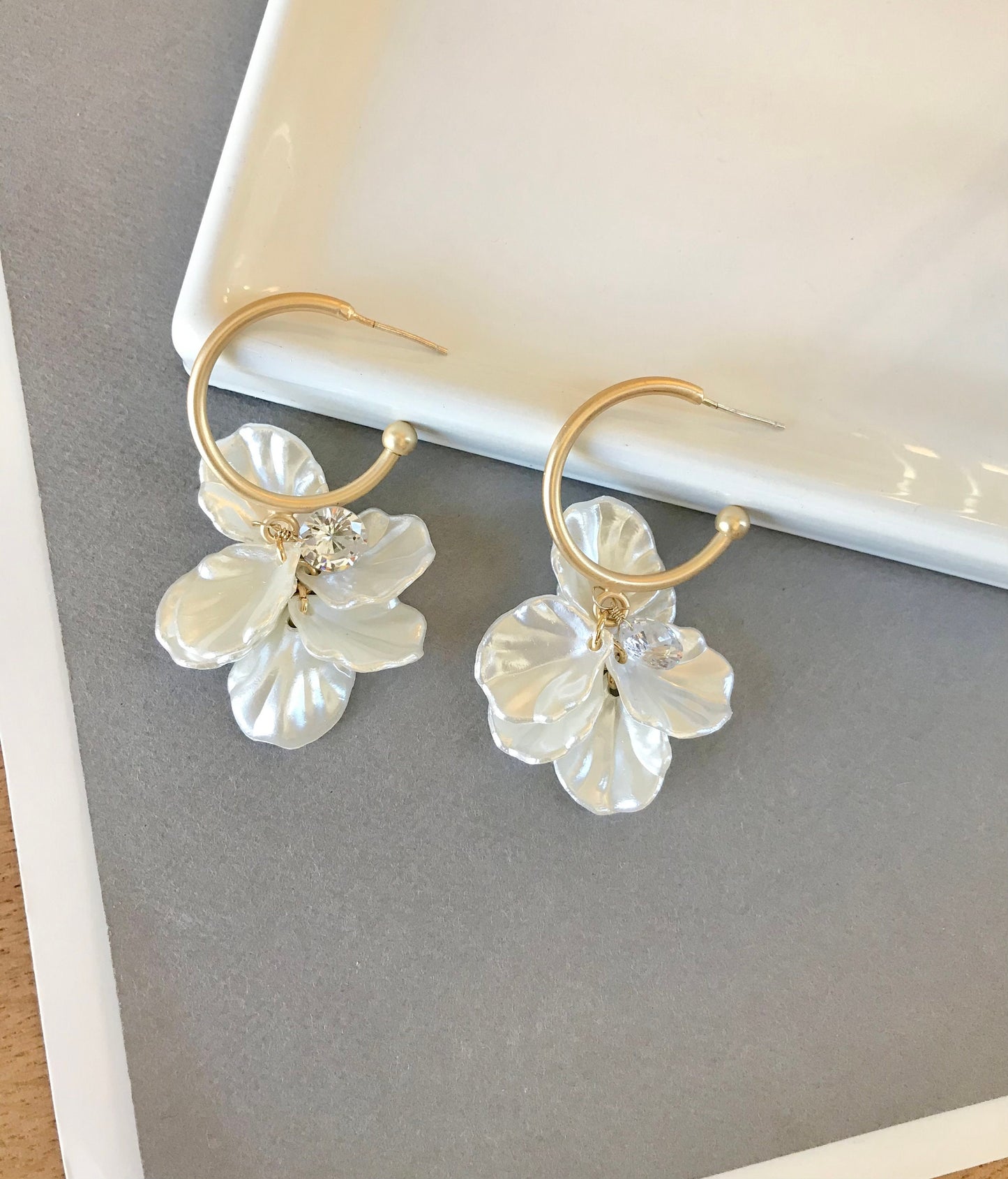 White petal hoop earrings