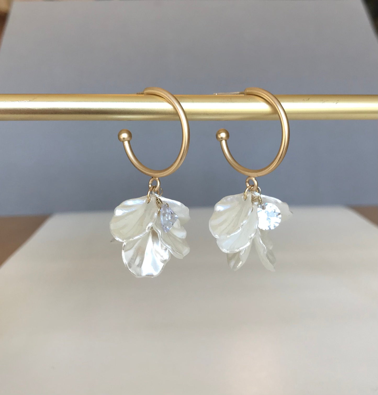 White petal hoop earrings